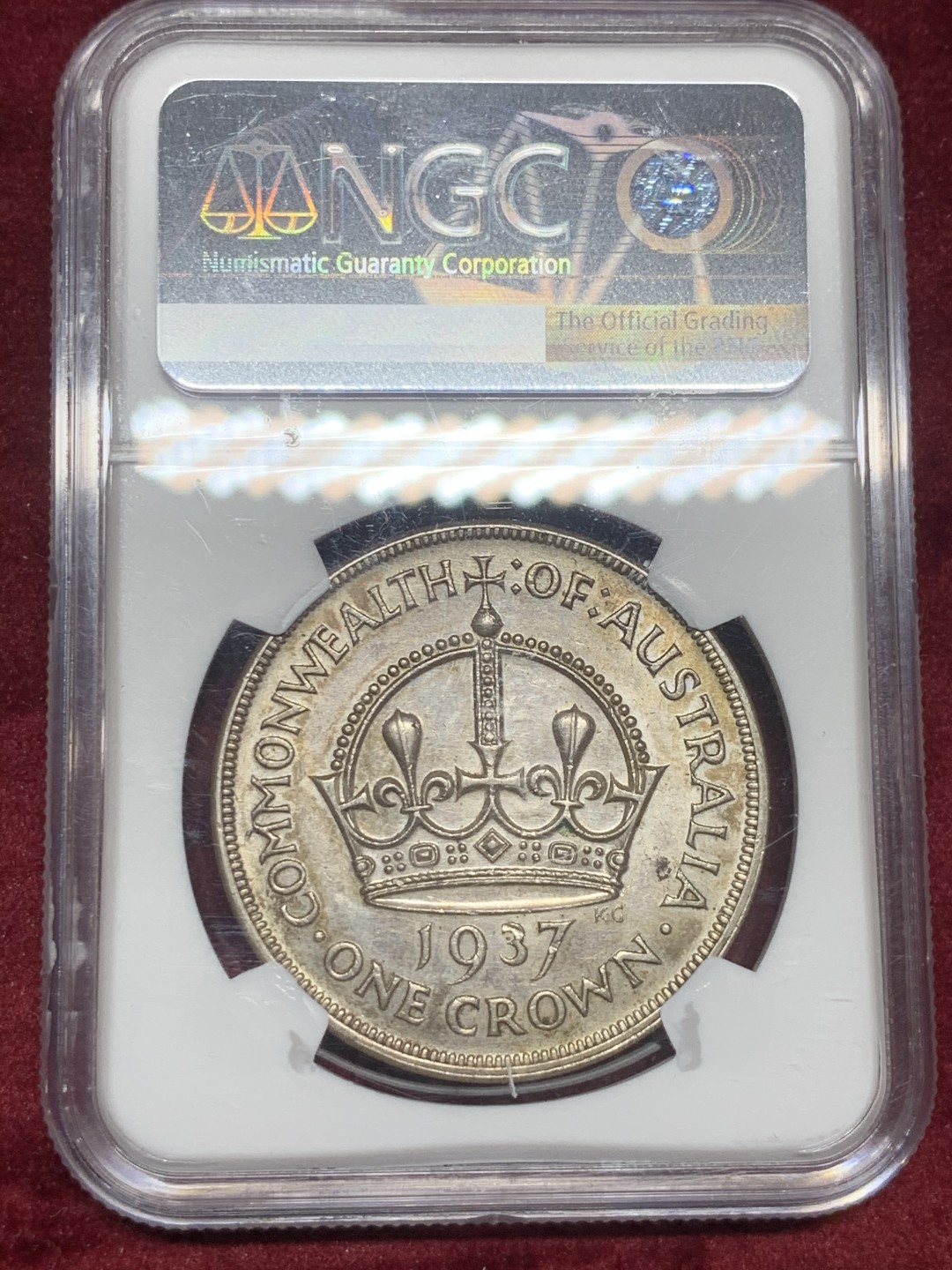 《竞宝斋》第63场-本周日 （全场不限金额包邮） ngc58分1937年澳大利亚乔治六世花冠1克朗，币面带一些黄油包浆挺漂亮的。