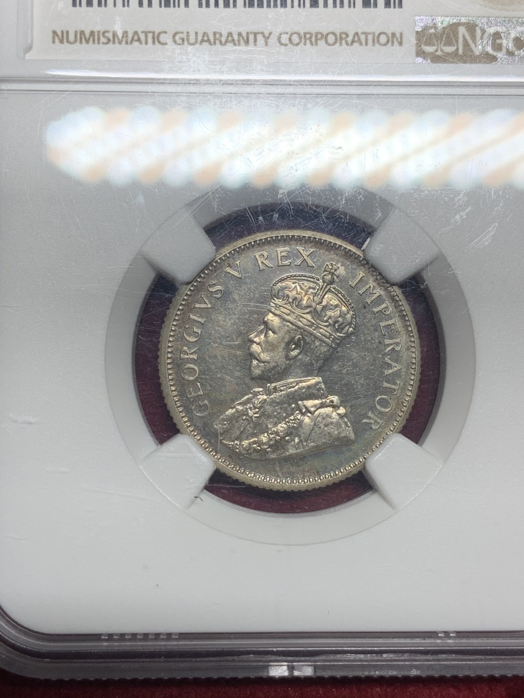 《竞宝斋》第63场-本周日 （全场不限金额包邮） NGC PF63 英属南非 1923年 乔治五世 1先令精制银币 镜面底板带彩包浆