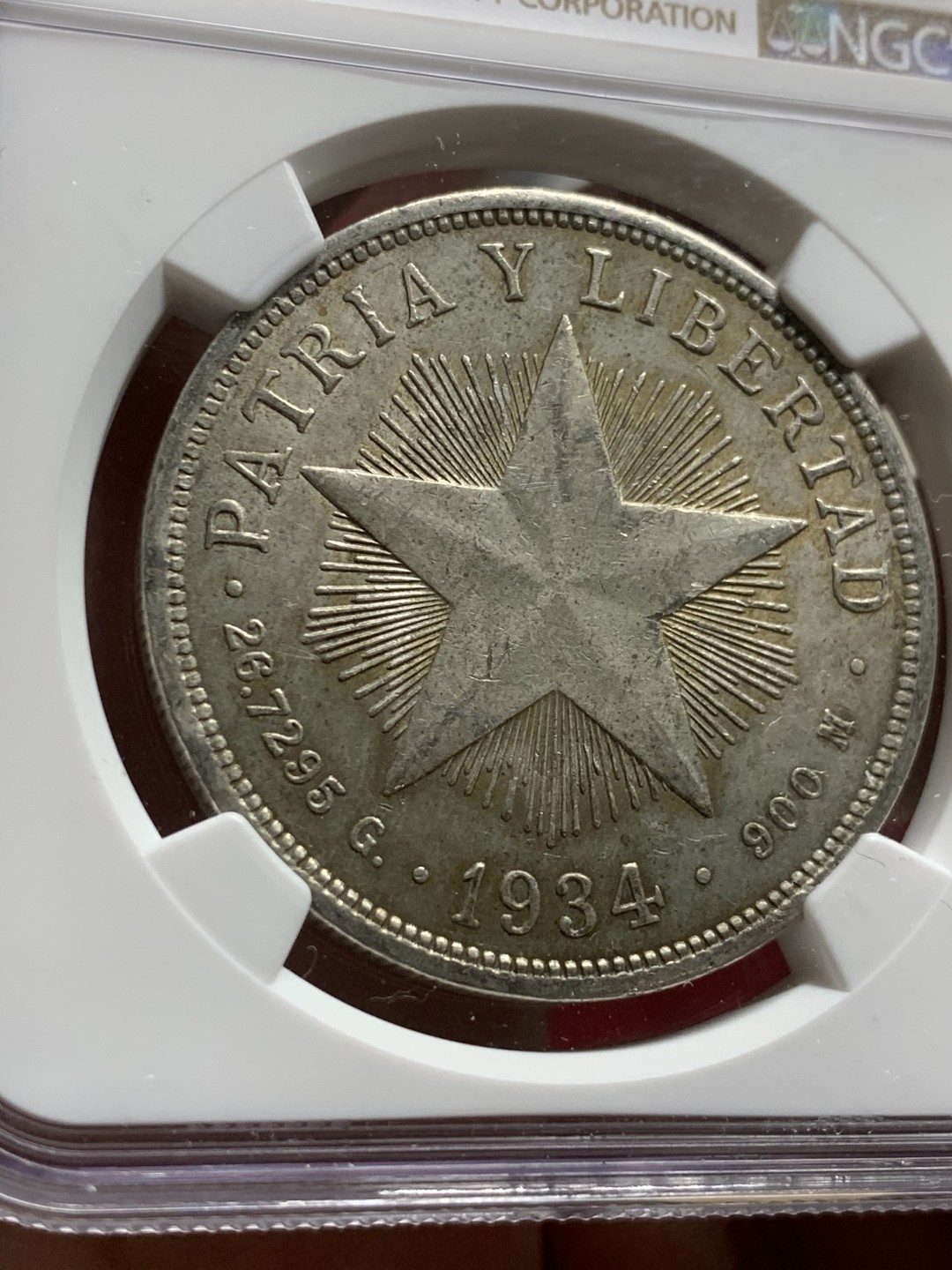 《竞宝斋》第63场-本周日 （全场不限金额包邮） NGC-AU 古巴1934年 1比索大五星 银币 好品原味 这个没给分太可惜了