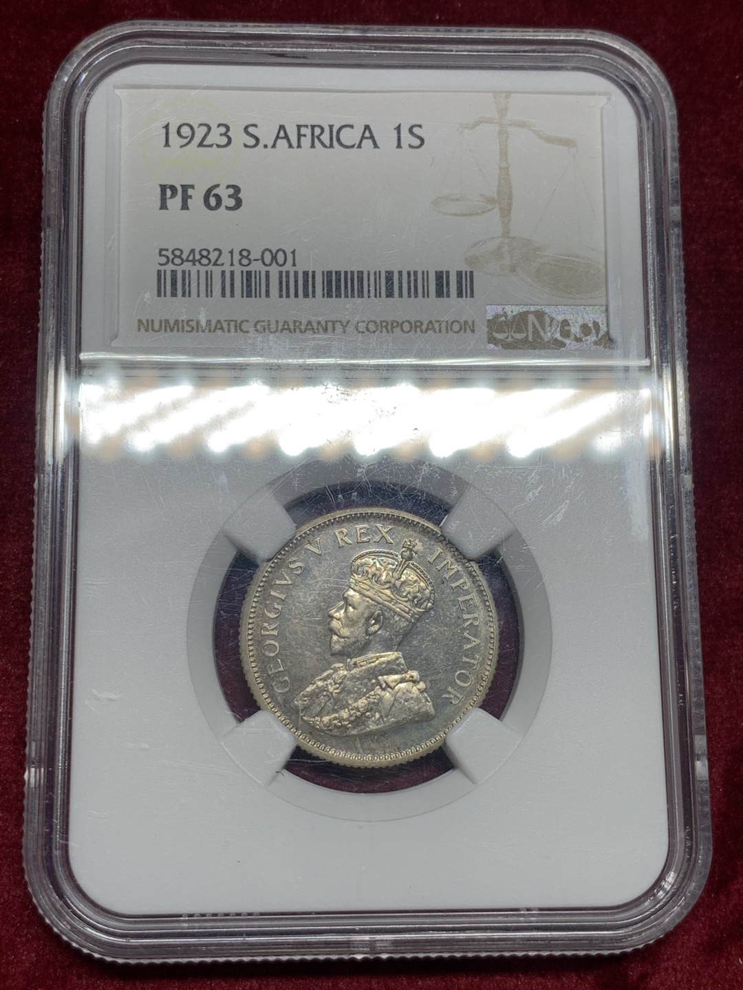 《竞宝斋》第63场-本周日 （全场不限金额包邮） NGC PF63 英属南非 1923年 乔治五世 1先令精制银币 镜面底板带彩包浆