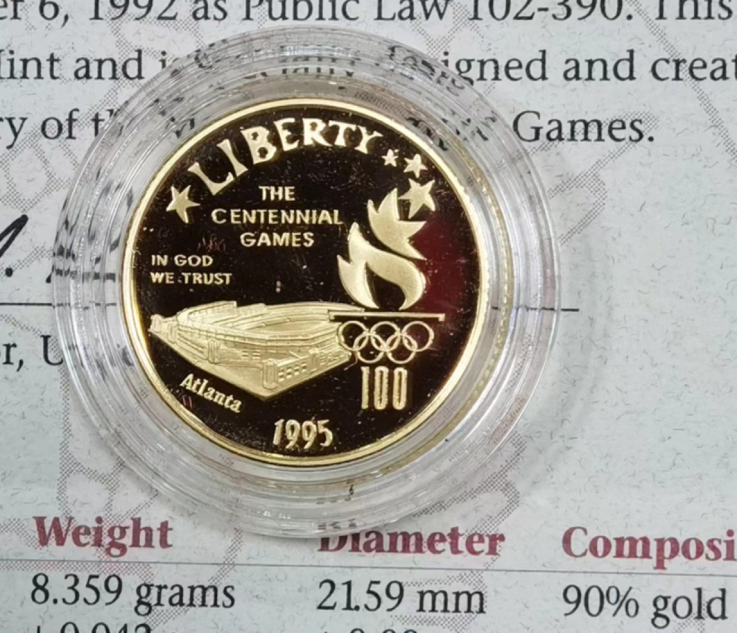 北京马甸外国钱币专卖微拍第七十八期，外国金银币专场，陆续上新，欢迎光临 1995年美国亚特兰大奥运会精制金币，重量：8.359克，成色900，有证书无盒 