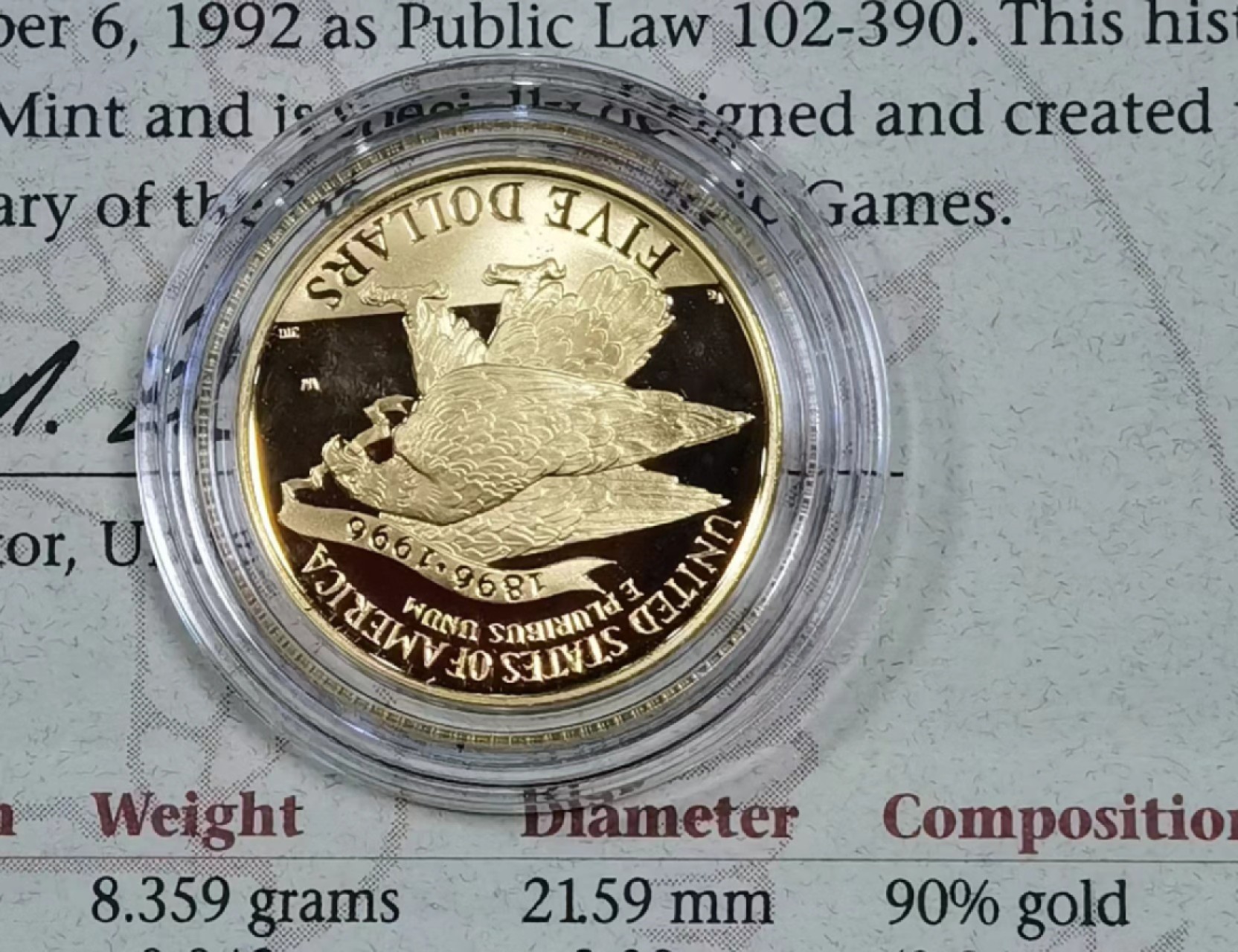 北京马甸外国钱币专卖微拍第七十八期，外国金银币专场，陆续上新，欢迎光临 1995年美国亚特兰大奥运会精制金币，重量：8.359克，成色900，有证书无盒 