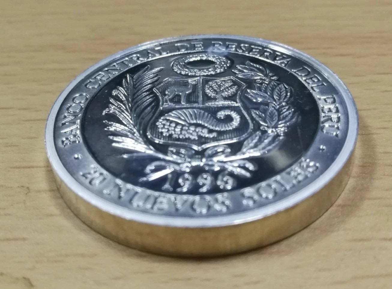 北京马甸外币专卖微拍第七十七期，非贵金属外国纪念币，流通币专场，陆续上新欢迎关注 稀少的1996年秘鲁纪念亚特兰大奥运会加厚纪念币