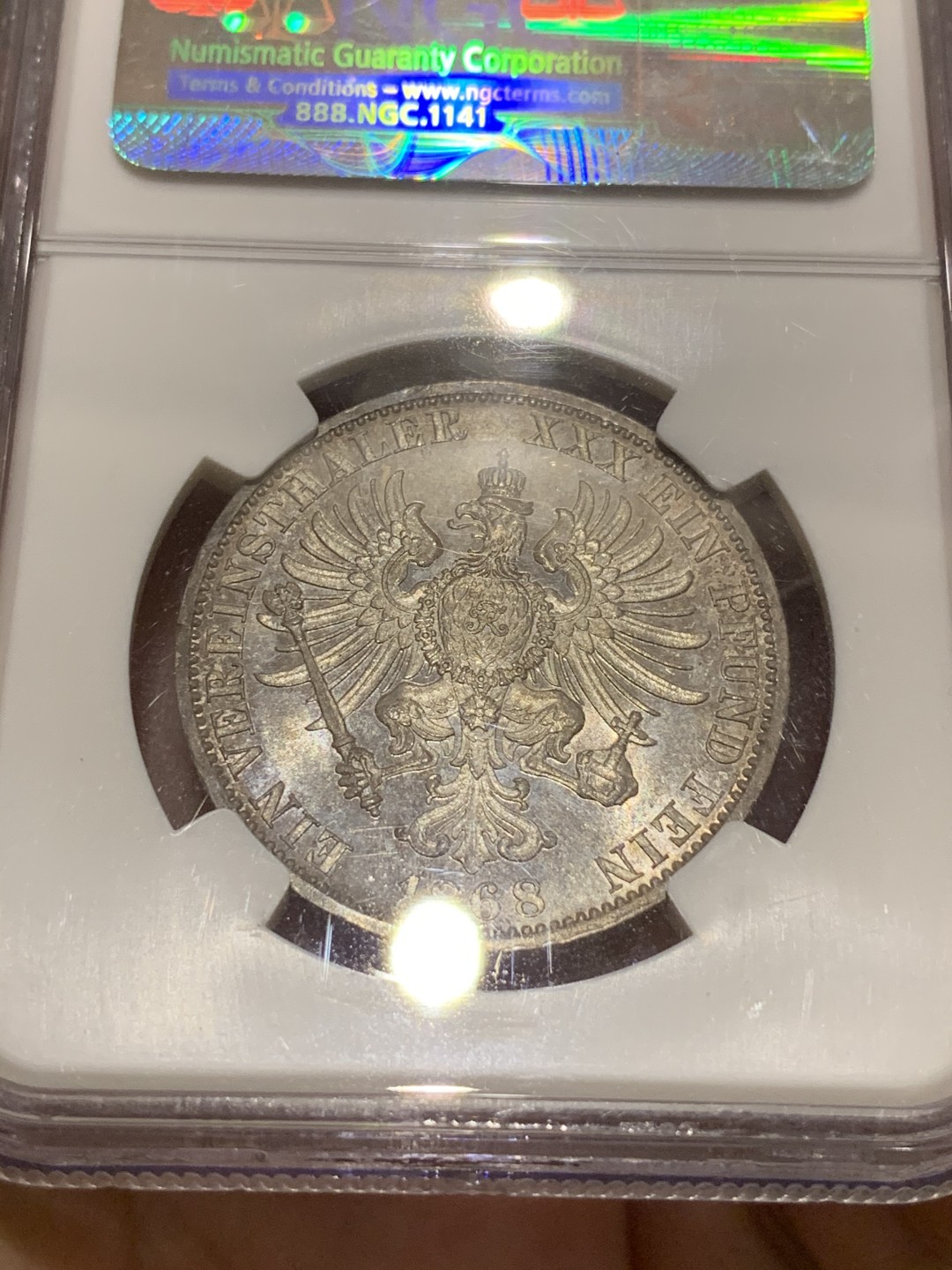 《竞宝斋》中天佳节（端午节特拍）6月12日-周日-第64场 NGC MS62 德国普鲁士 1868年 背鹰 1泰勒银币 PL感的质感 难得状态