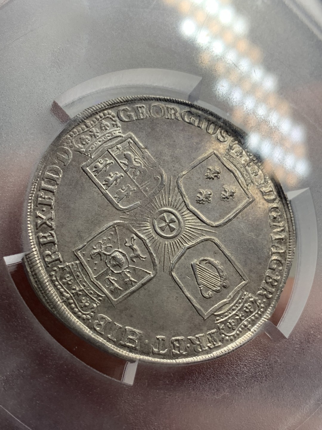 《竞宝斋》中天佳节（端午节特拍）6月12日-周日-第64场 PCGS亚军分 AU53 德国 1725年乔治一世 不伦瑞克-卡伦堡 野人泰勒 乔治一世继承了大不列颠和爱尔兰王位 所以背面为英国的十字章纹 状态难得