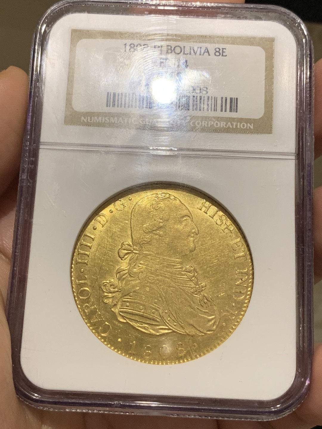 《竞宝斋》中天佳节（端午节特拍）6月12日-周日-第64场 NGC-AU55 玻利维亚 1808年卡洛斯四世 8埃斯库多 27克大金币 关门年份 玻利维亚少见 老盒子 背面状态惊人