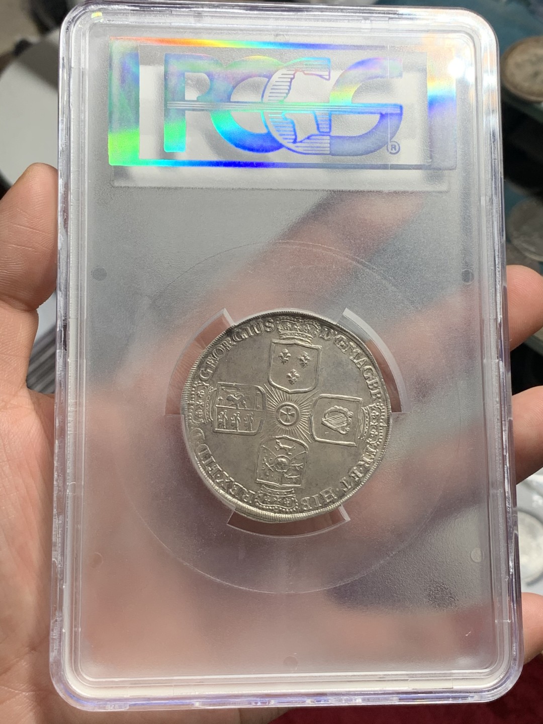 《竞宝斋》中天佳节（端午节特拍）6月12日-周日-第64场 PCGS亚军分 AU53 德国 1725年乔治一世 不伦瑞克-卡伦堡 野人泰勒 乔治一世继承了大不列颠和爱尔兰王位 所以背面为英国的十字章纹 状态难得