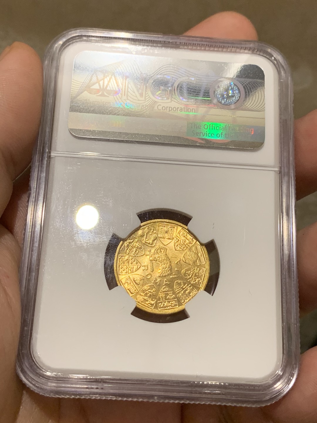 《竞宝斋》中天佳节（端午节特拍）6月12日-周日-第64场 NGC-MS64 罗马尼亚1944三国王金币上涨潜力品种今年4月HA拍卖到手要645美刀，现在国际邮路几乎停滞。喜欢罗马尼亚币的不容错过