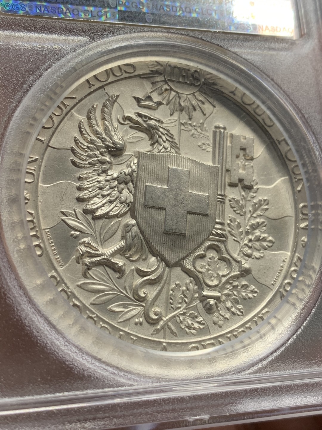 《竞宝斋》中天佳节（端午节特拍）6月12日-周日-第64场 PCGS SP62 瑞士1887年日内瓦射击节高浮雕精美大银章 加厚盒封装 越来越喜欢瑞士章了