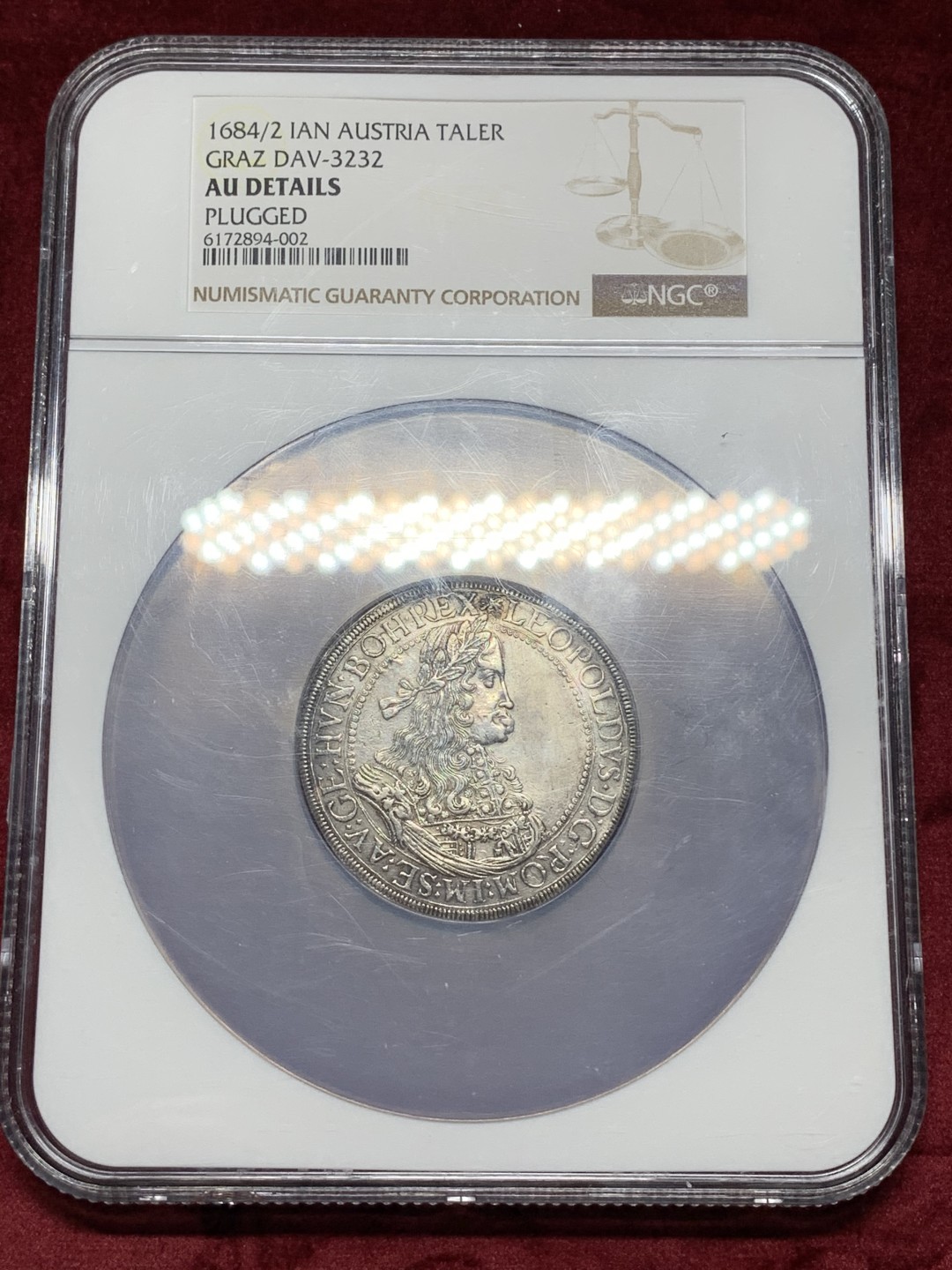 《竞宝斋》中天佳节（端午节特拍）6月12日-周日-第64场 NGC-AU 神圣罗马帝国 1684/2 年骑字版，利奥波德大泰勒格拉兹厂出品原光全深打，比hall厂珍稀多了 标注为：PLUGGED  细节看图