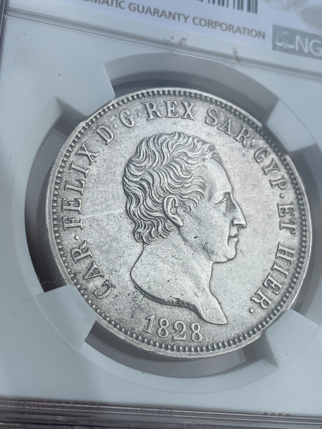 《竞宝斋》中天佳节（端午节特拍）6月12日-周日-第64场 NGC冠军分-MS62意大利撒丁王国1828年5里拉，都灵厂唯一最高分。同款64+折合人民币3.6万。性价比极高