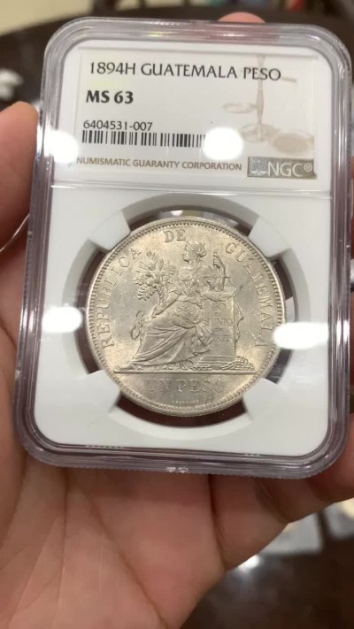 《竞宝斋》中天佳节（端午节特拍）6月12日-周日-第64场 第三名 NGC-MS63 危地马拉 1894年 坐人拿花 1比索 大银币 车轮光 顶级好品