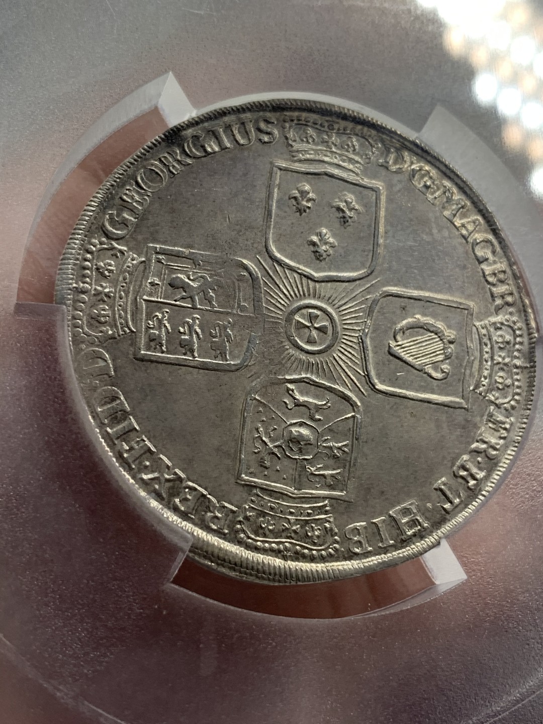 《竞宝斋》中天佳节（端午节特拍）6月12日-周日-第64场 PCGS亚军分 AU53 德国 1725年乔治一世 不伦瑞克-卡伦堡 野人泰勒 乔治一世继承了大不列颠和爱尔兰王位 所以背面为英国的十字章纹 状态难得