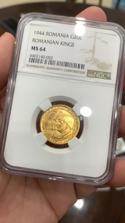 《竞宝斋》中天佳节（端午节特拍）6月12日-周日-第64场 NGC-MS64 罗马尼亚1944三国王金币上涨潜力品种今年4月HA拍卖到手要645美刀，现在国际邮路几乎停滞。喜欢罗马尼亚币的不容错过