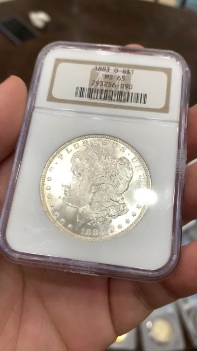 《竞宝斋》中天佳节（端午节特拍）6月12日-周日-第64场 NGC-MS65 美国1883 O版摩根 光度很不错 凝霜白净 老盒保存的这么好不容易