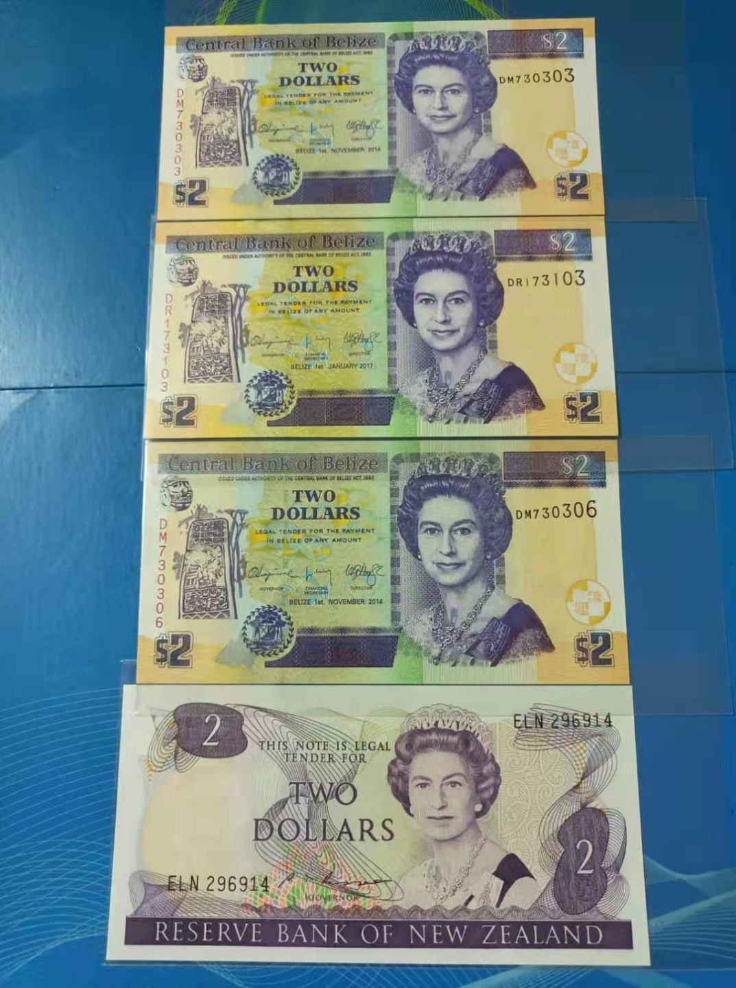 Chase Auction 第13期 - - 中外纸币、民国钞联拍！ 新西兰早期版别女王2元ELN292614全新UNC，佰利兹女王2元2014年DM730306、730303，DR173103，UNC四枚同拍，如图发货！