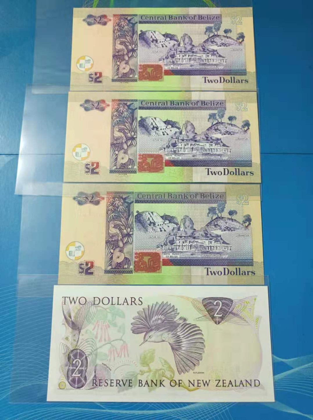 Chase Auction 第13期 - - 中外纸币、民国钞联拍！ 新西兰早期版别女王2元ELN292614全新UNC，佰利兹女王2元2014年DM730306、730303，DR173103，UNC四枚同拍，如图发货！