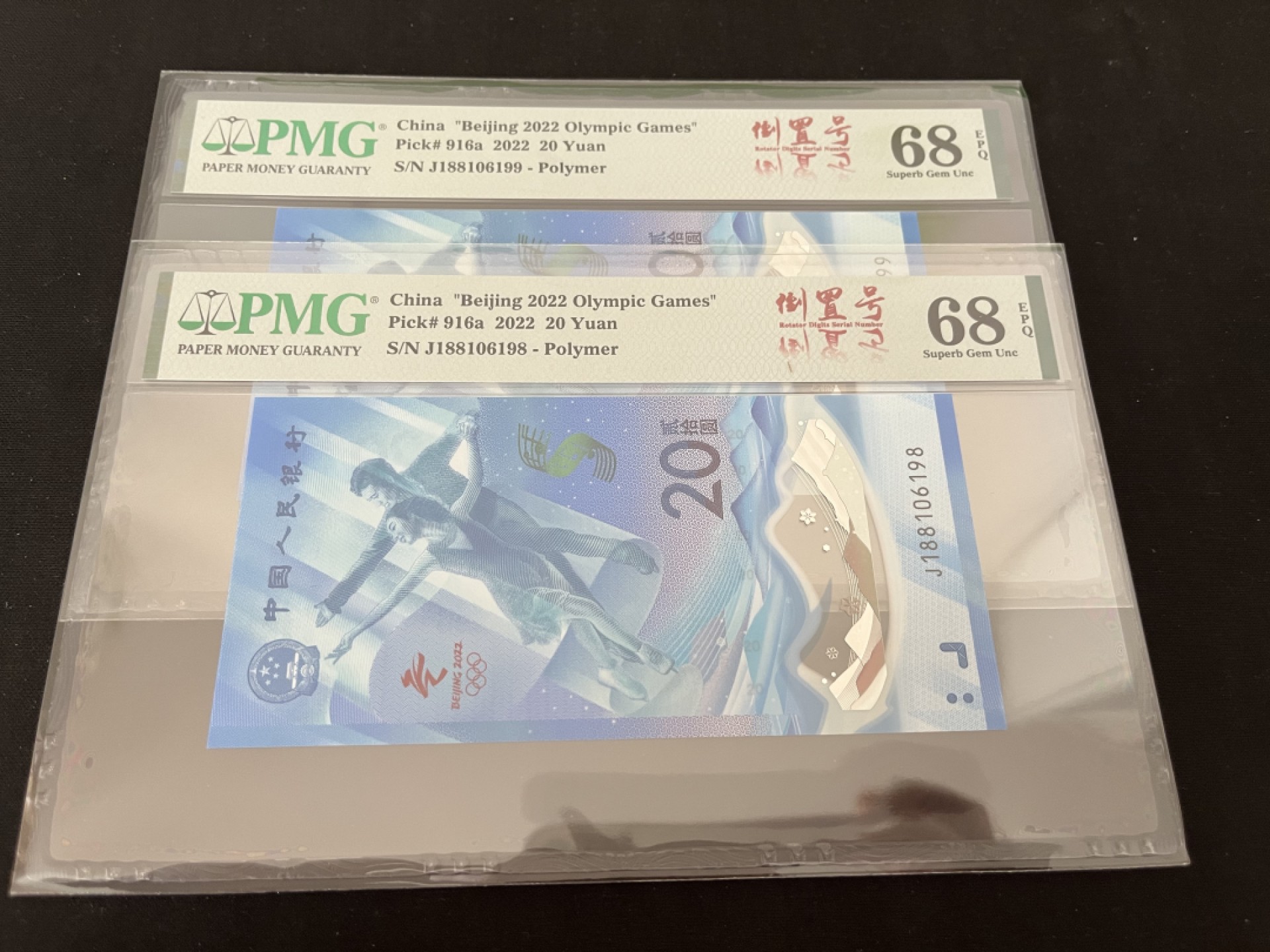 【华誉王者】2038期拍卖 冬奥钞  188头倒置靓号68E高分两连号，一枚尾8，一枚尾99，状态一流，壳子无划痕，J188106198 J188106199