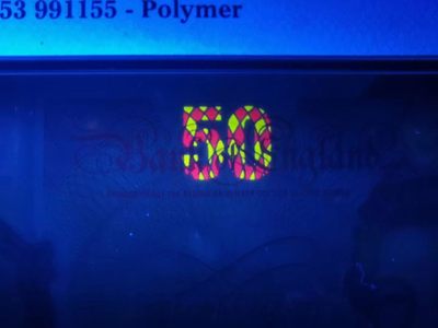 《张总收藏》61期——冠军外币 新版英国50镑塑料钞PMG66E数三915组合三对子全奇数