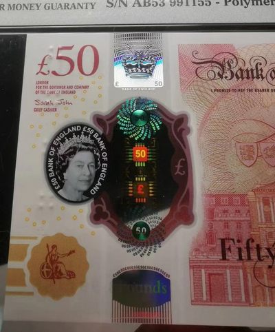 《张总收藏》61期——冠军外币 新版英国50镑塑料钞PMG66E数三915组合三对子全奇数