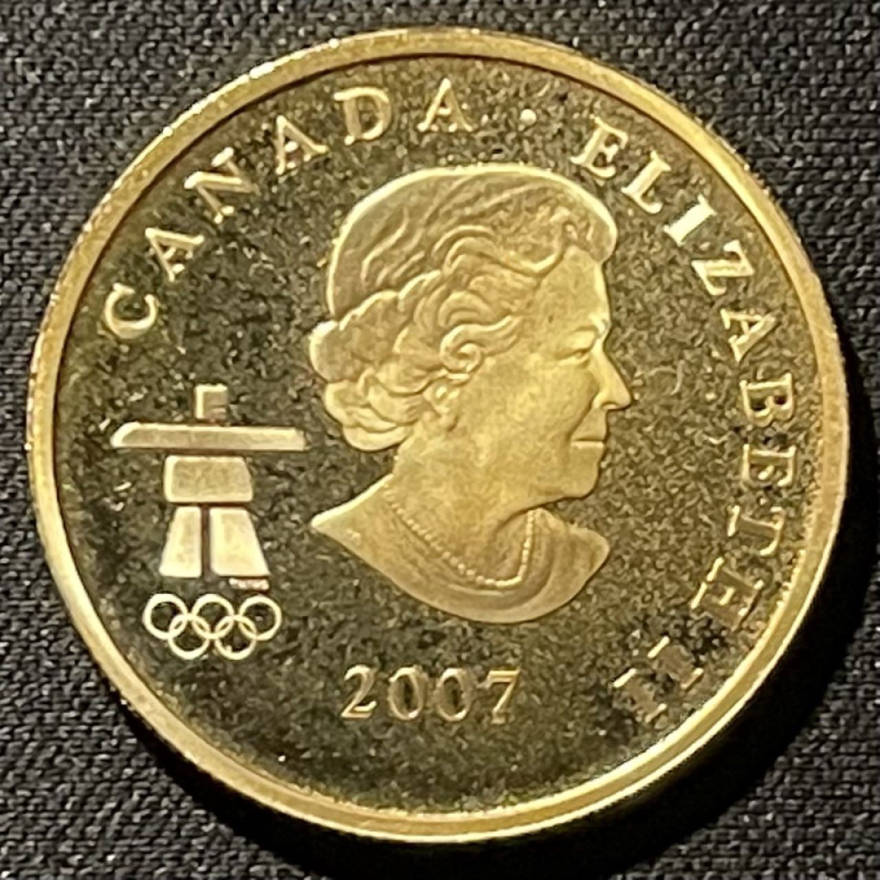 紫瑗钱币——第196期拍卖 加拿大 2007年 温哥华冬奥会 国旗呐喊 75元 12克 0.583斤 精制