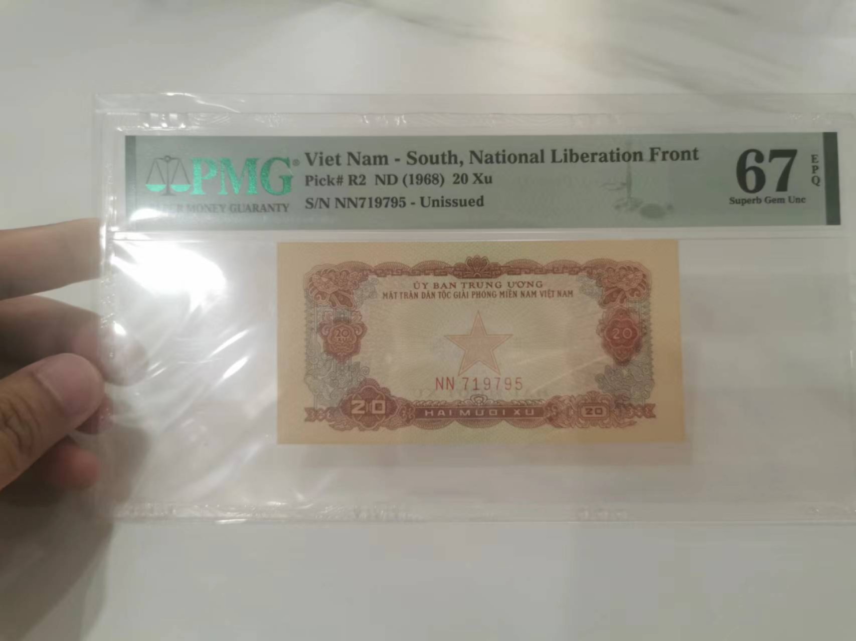 13.【鲸贝乐淘★道德经】“万物作而弗始，生而弗有，为而弗恃，功成而不居”号拍卖 【中国代印★越南🇻🇳】编号NN719795，1968年20Xu，未发行，PMG67E