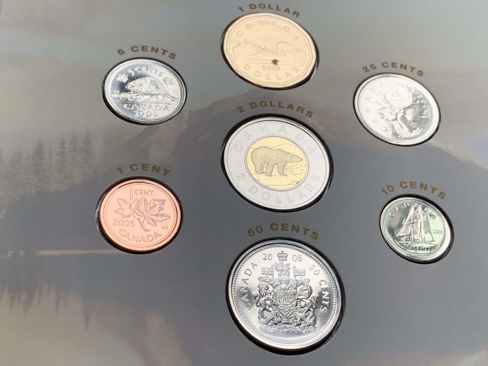 《竞宝斋》第66场-本周日，周一2场连拍（全场不限金额包邮） 两册 加拿大2005年 七枚装 封装套币 完美状态