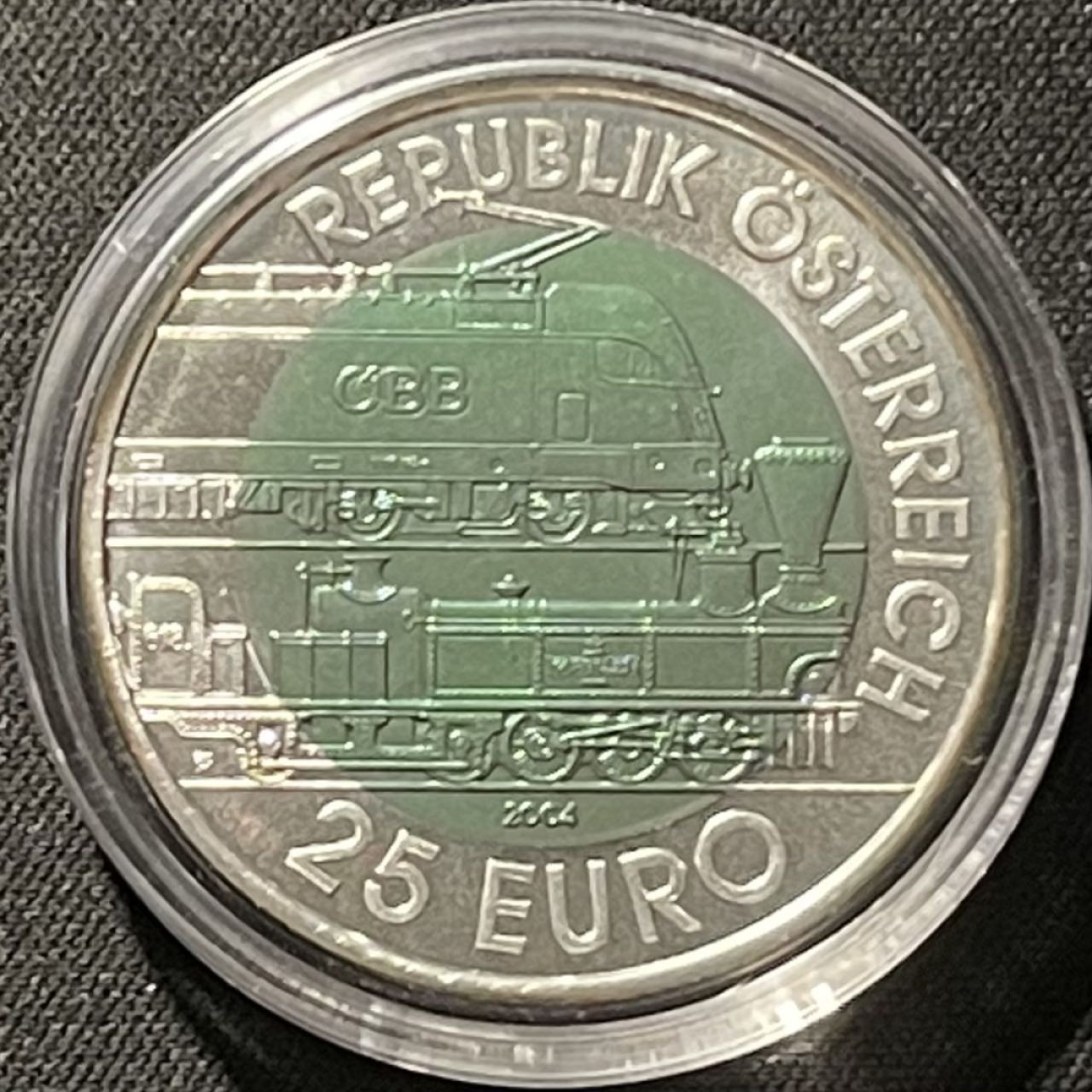 紫瑗钱币——第196期拍卖 奥地利 2004年 森梅林格铁路 150周年 25欧元 银铌纪念币  原盒证书