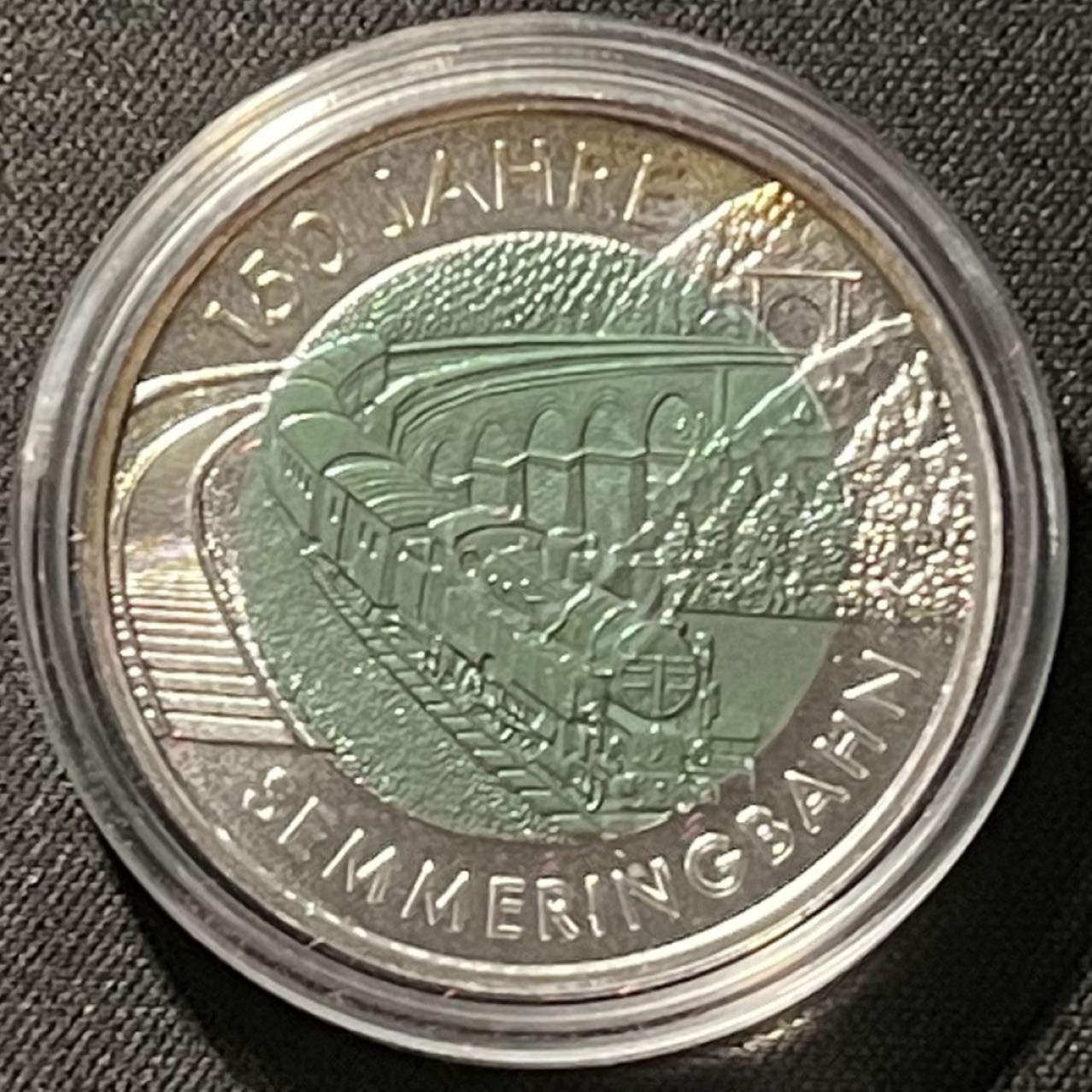 紫瑗钱币——第196期拍卖 奥地利 2004年 森梅林格铁路 150周年 25欧元 银铌纪念币  原盒证书