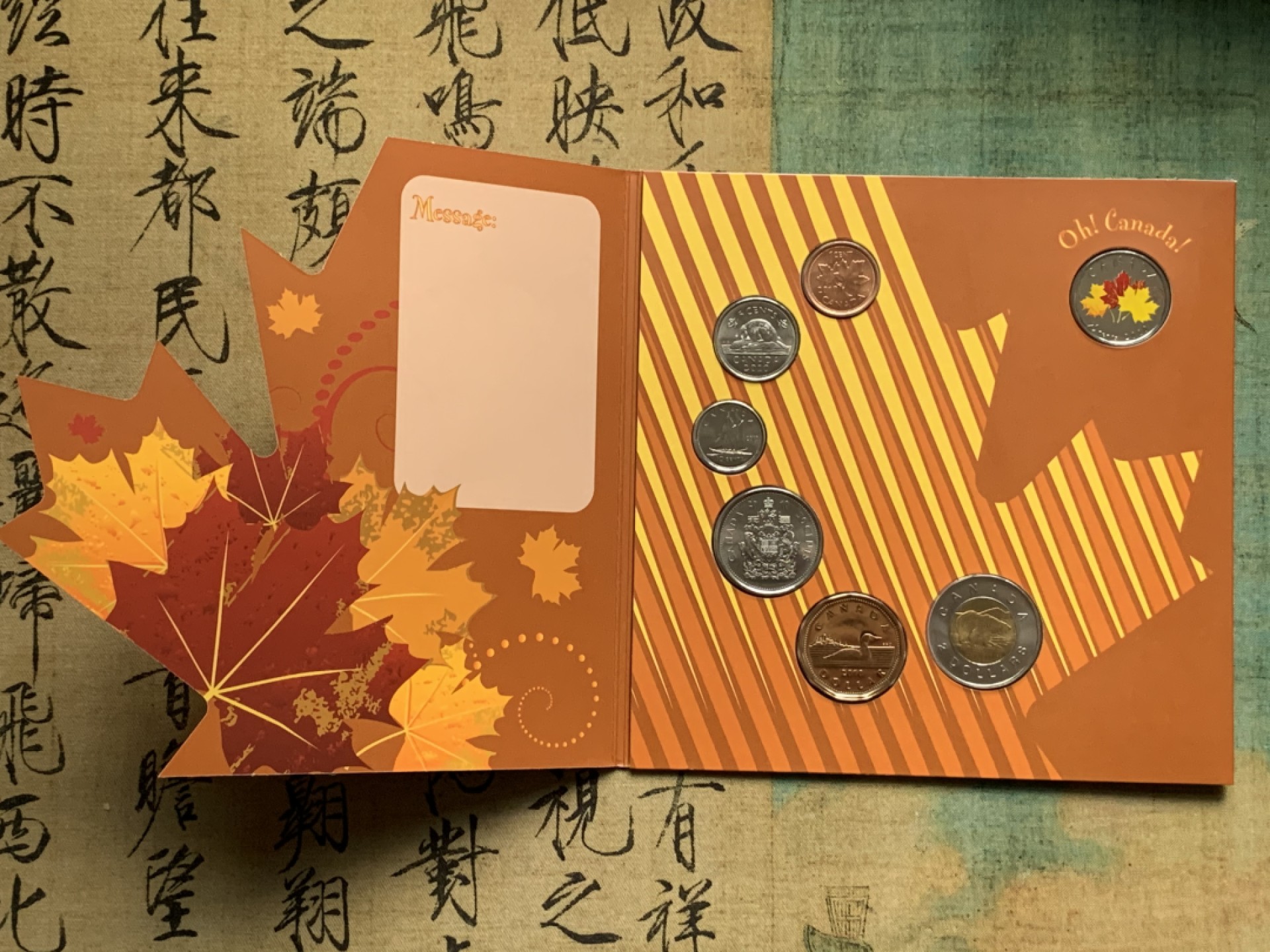 《竞宝斋》第66场-本周日，周一2场连拍（全场不限金额包邮） 两册 加拿大2010年 枫叶礼品套装 可以写赠语 七枚套 封装套币 完美状态