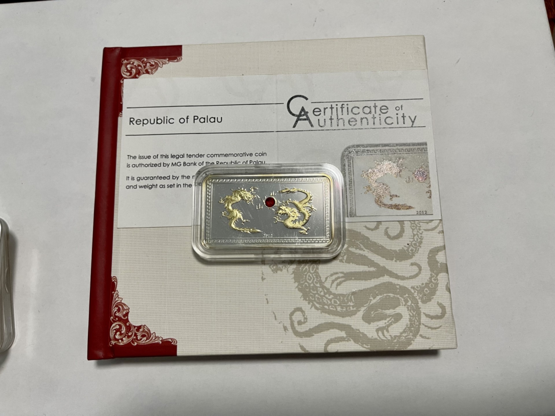 CSIS-GREAT评级精品钱币拍卖第一百四十九期 帕劳龙年镀金镶嵌施华洛世奇水晶银币带盒证