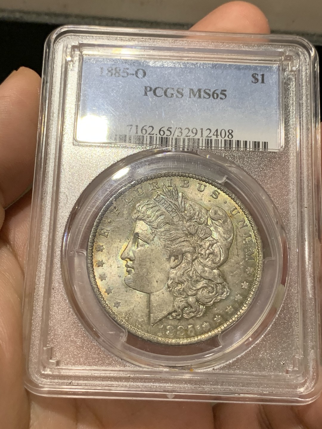 《竞宝斋》第66场-本周日，周一2场连拍（全场不限金额包邮） PCGS MS65 美国1885 摩根五彩银币，双面五彩非常难得，老盒子严评