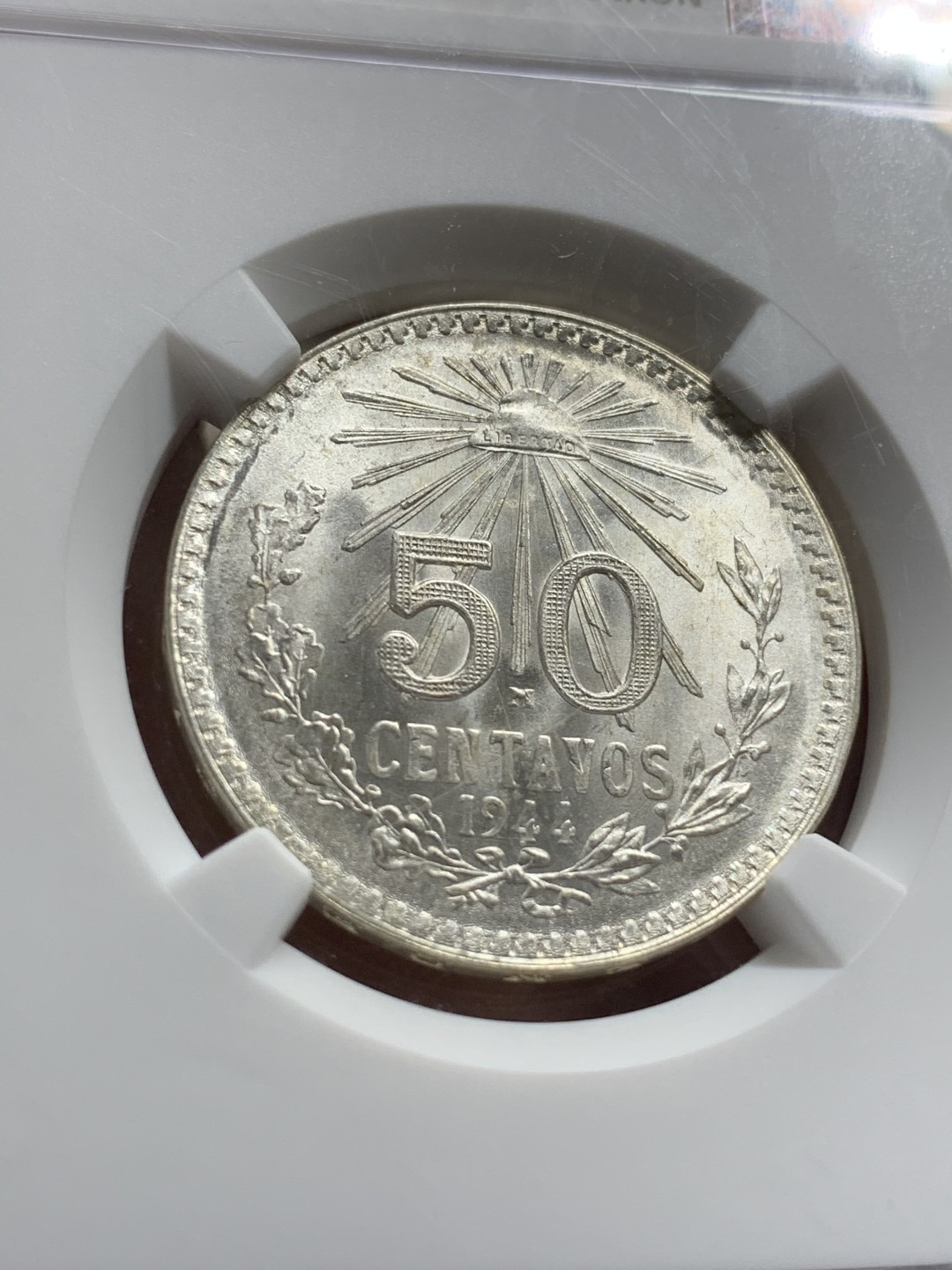 《竞宝斋》第66场-本周日，周一2场连拍（全场不限金额包邮） NGC-MS65 墨西哥 1944-M 墨西哥半比索 底板完好 银光熠熠 有镜面效果