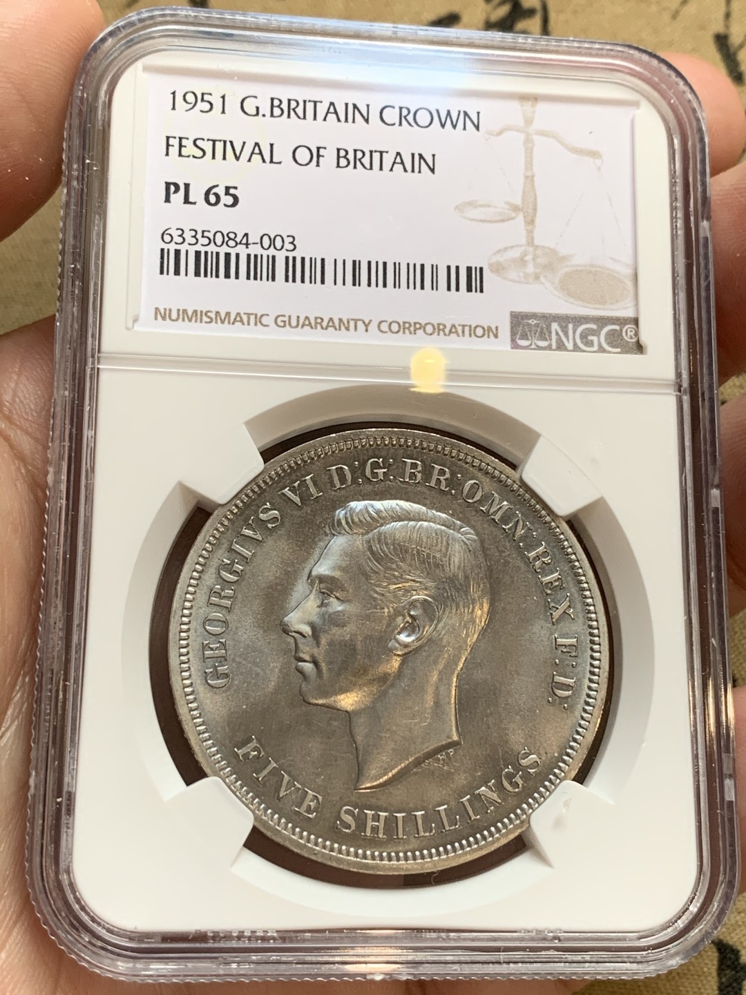 《竞宝斋》第66场-本周日，周一2场连拍（全场不限金额包邮） NGC PL65 英国1951年乔治六世一克朗镍马剑银币  上涨品种 21年12月同分外拍近200美元