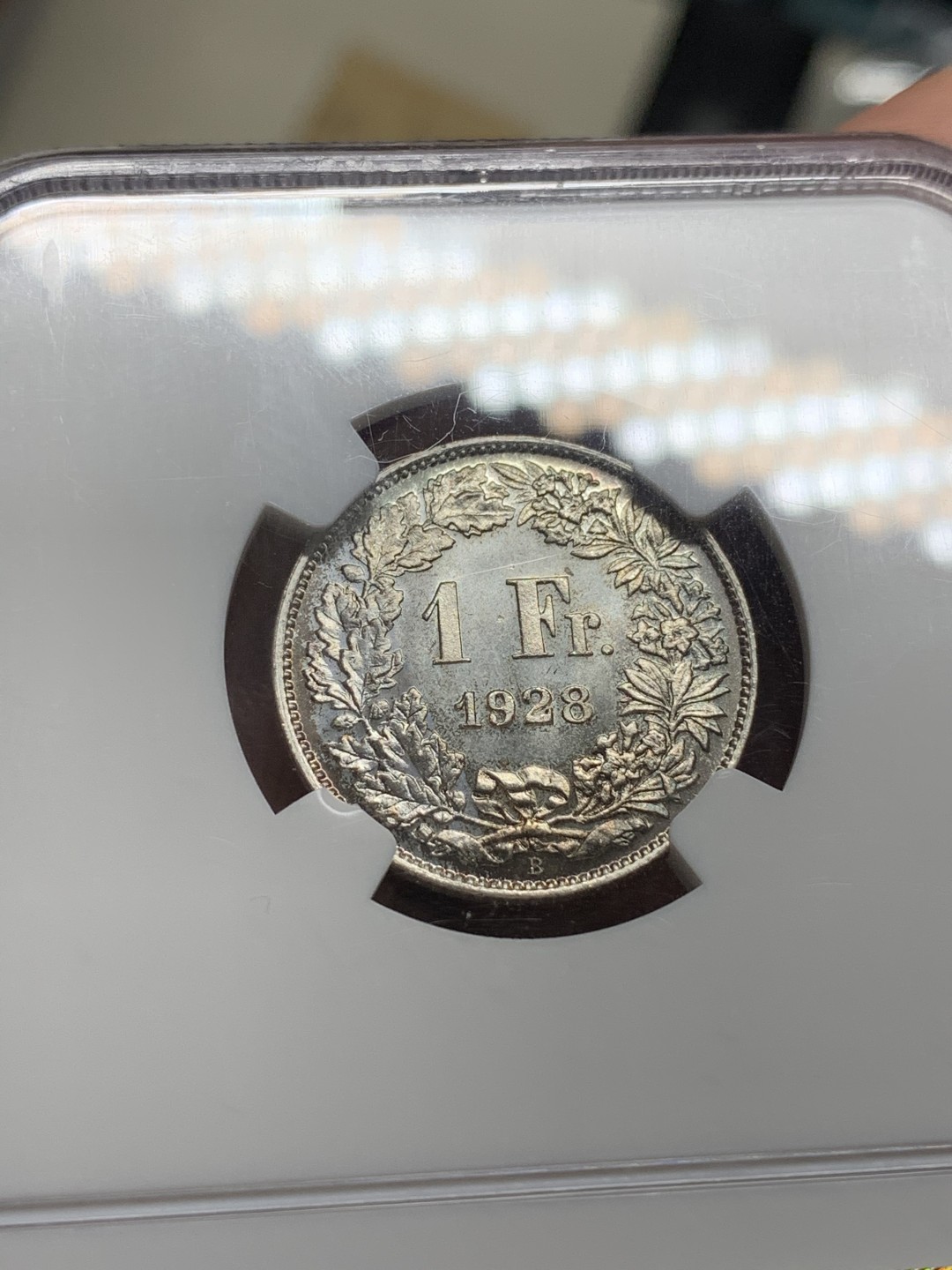 《竞宝斋》第66场-本周日，周一2场连拍（全场不限金额包邮） 冠军分 NGC MS67！1928年瑞士1法郎银币 顶极品相 强车轮霜光 双面PL感  非常优雅的赫尔维蒂亚 美！