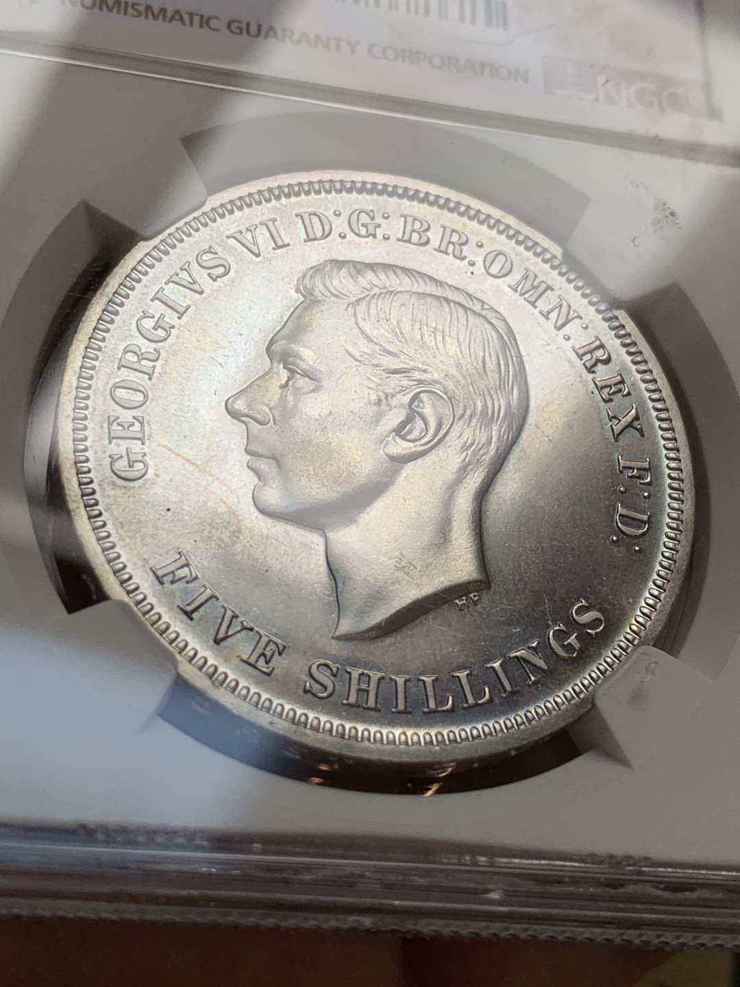 《竞宝斋》第66场-本周日，周一2场连拍（全场不限金额包邮） NGC PL65 英国1951年乔治六世一克朗镍马剑银币  上涨品种 21年12月同分外拍近200美元