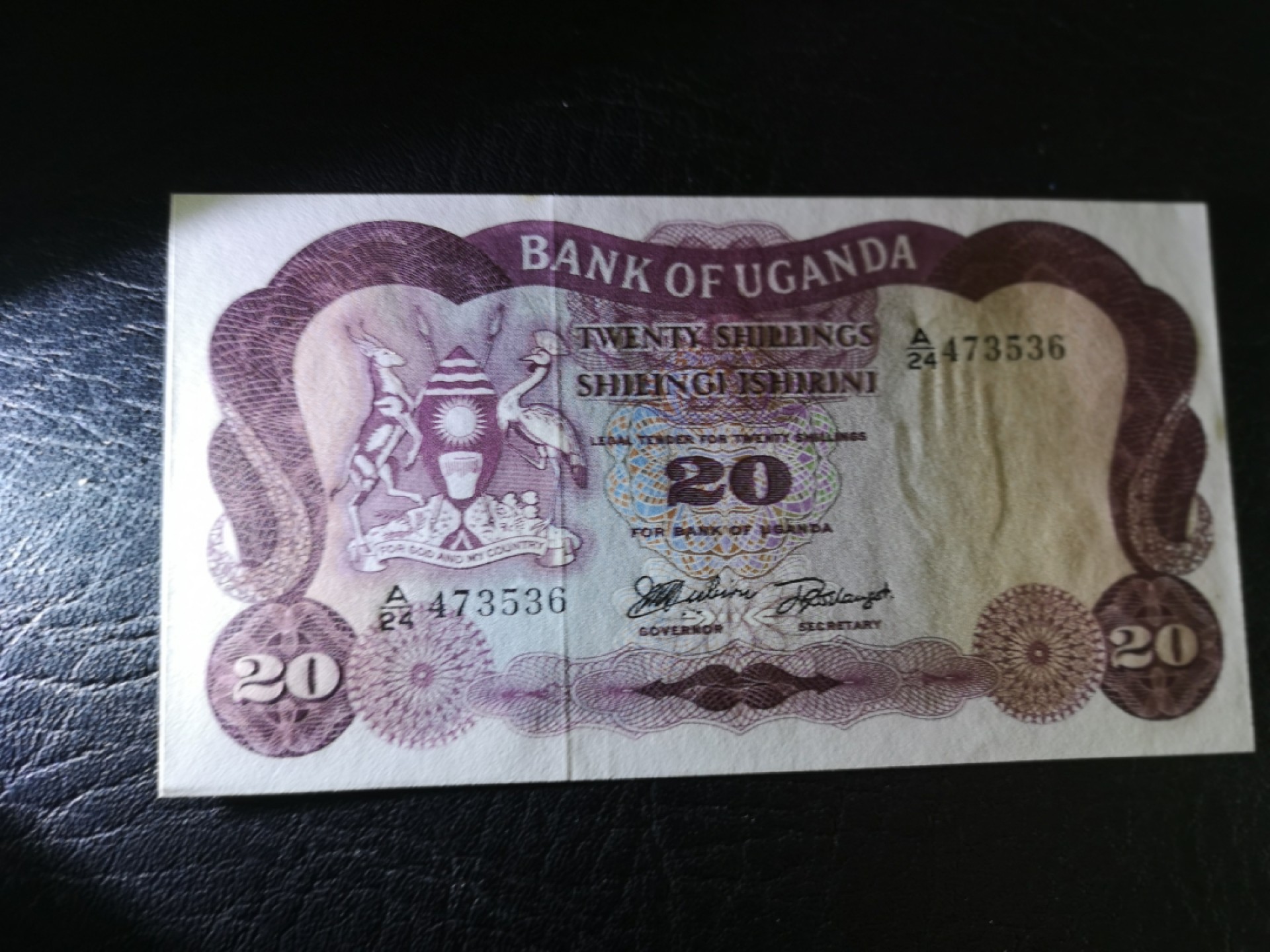 《外钞收藏家》第一百八十四期拍卖 乌干达20先令 全新 有个小瑕疵潮点