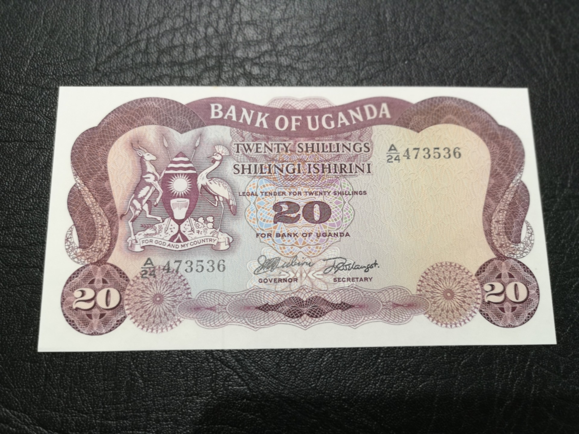 《外钞收藏家》第一百八十四期拍卖 乌干达20先令 全新 有个小瑕疵潮点