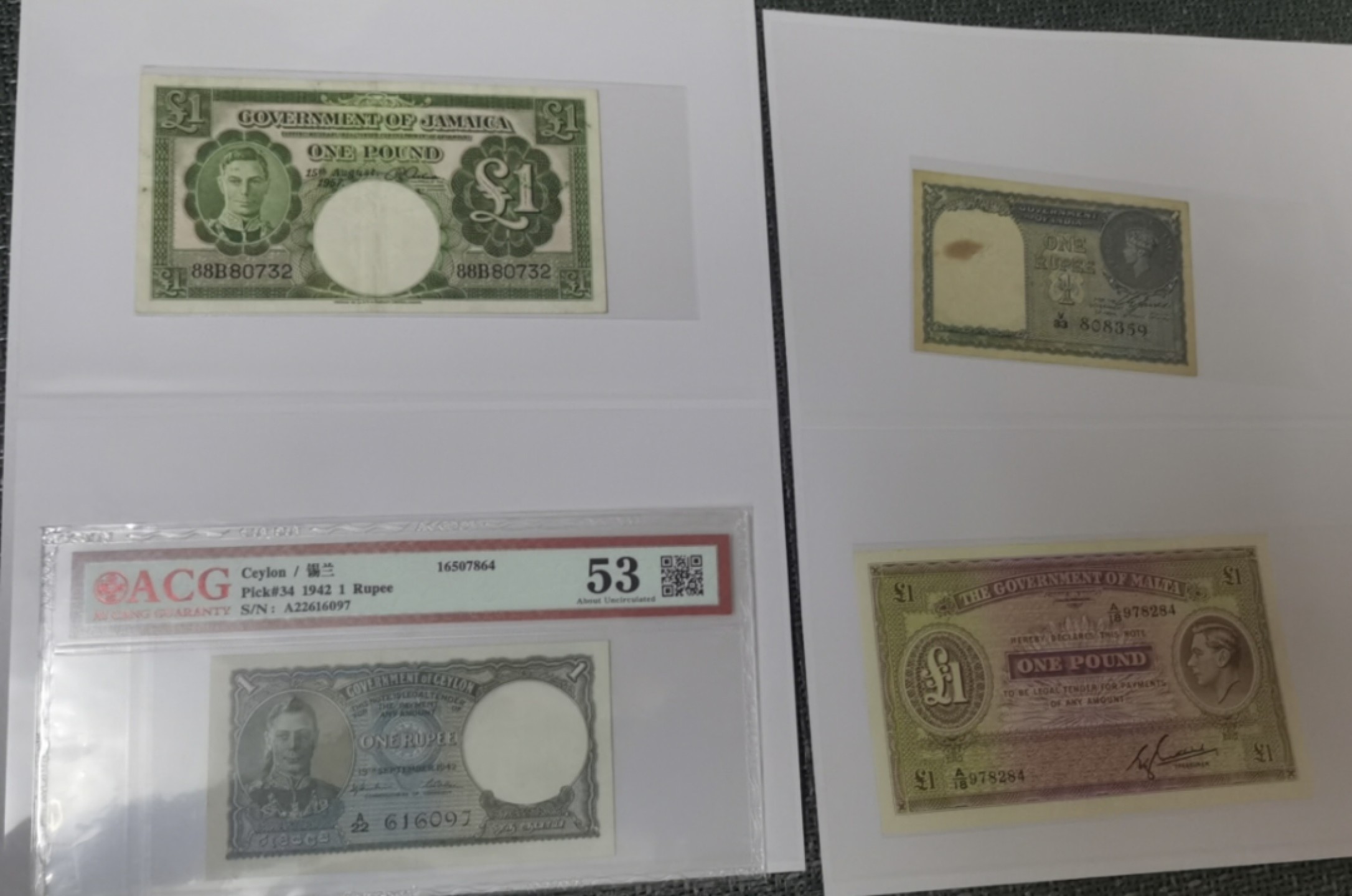 Chase Auction 第14期 - - 中外钱币、纪念钞、民国钞联拍（增加若干拍品） 牙买加1镑等乔治六世纸币四张，流通品！