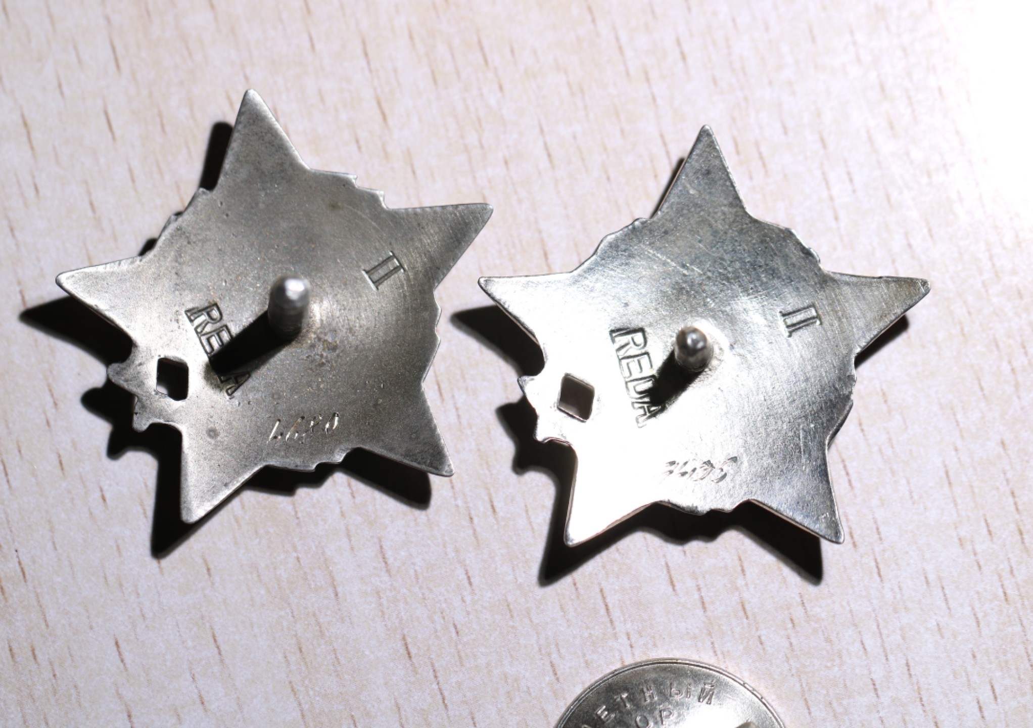 大猫徽章拍卖第195期 南斯拉夫游击队之星一组4枚 银质好品（其中一枚二级无轮盘）