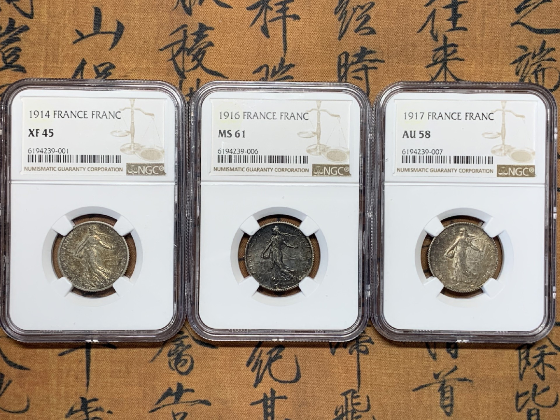 《竞宝斋》第67场-本周日，周一，周四.3场连拍（全场不限金额包邮） （3枚一起）NGC MS61,AU58,XF45分各一枚 法国 早期 1法郎 银币 早期老包浆 状态很不错