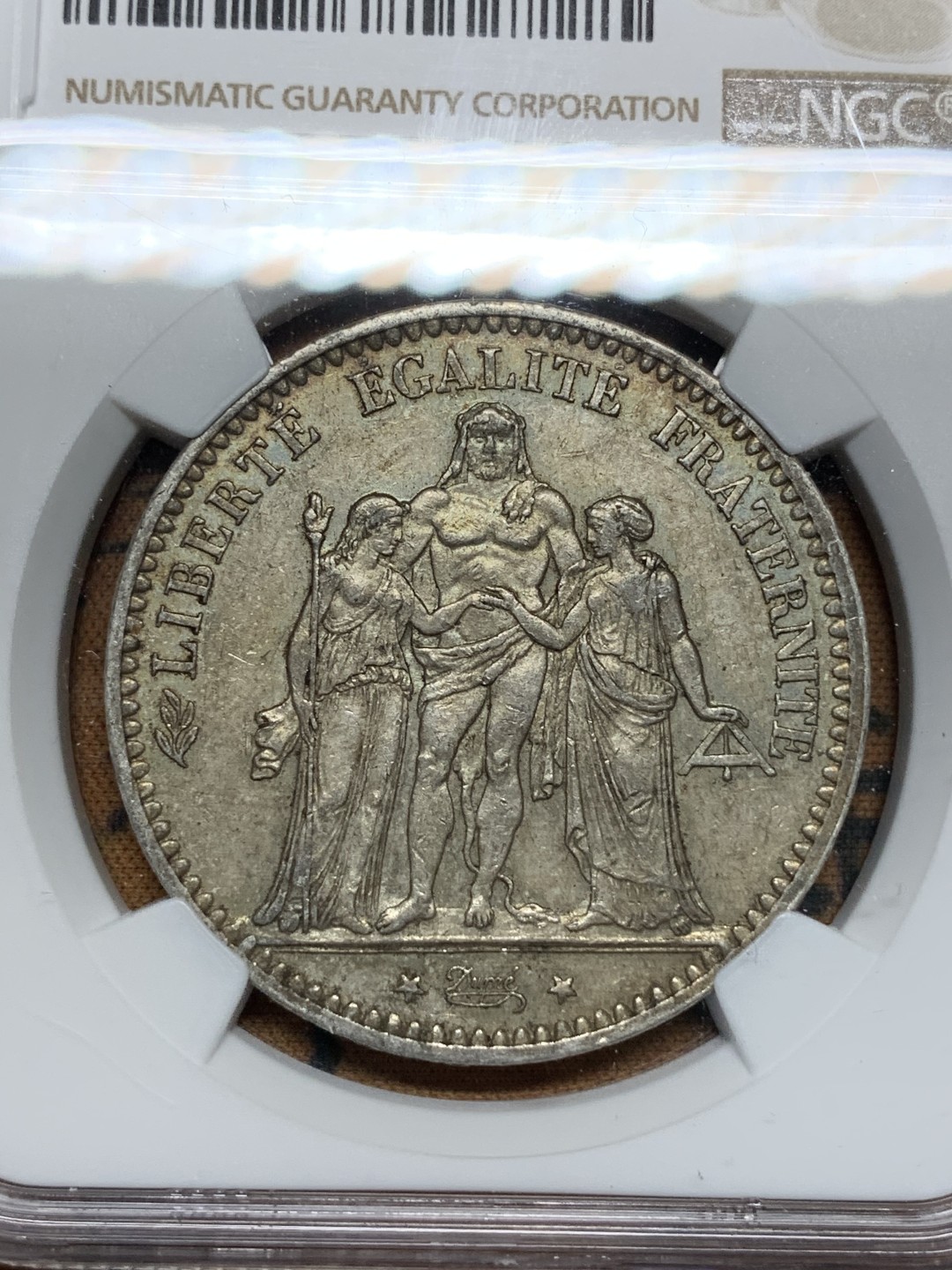 《竞宝斋》第67场-本周日，周一，周四.3场连拍（全场不限金额包邮） NGC-AU53 法国1877年 大力神 5法郎大银币 老包浆 底板也不错