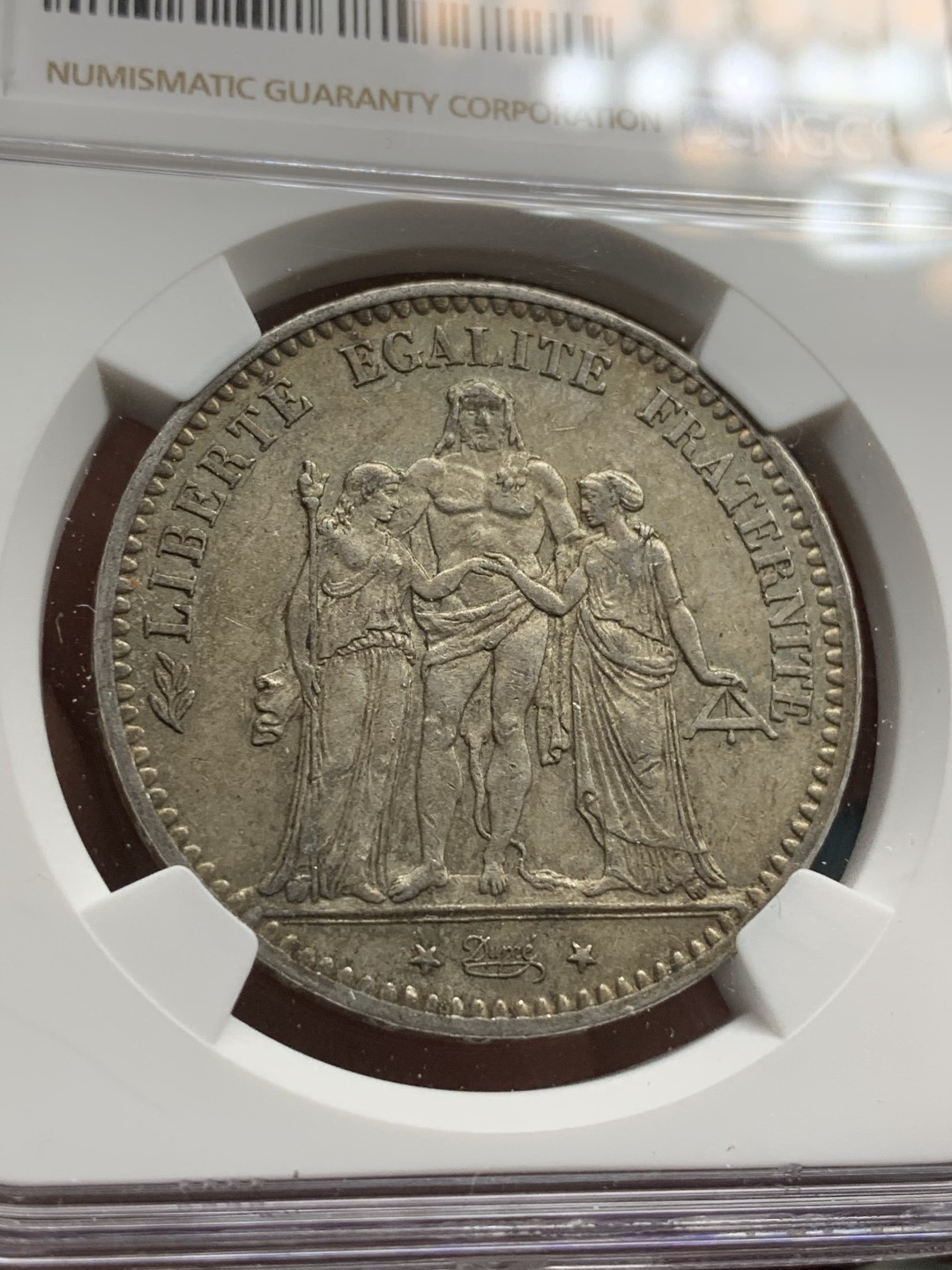 《竞宝斋》第67场-本周日，周一，周四.3场连拍（全场不限金额包邮） NGC-AU53 法国1877年 大力神 5法郎大银币 老包浆 底板也不错