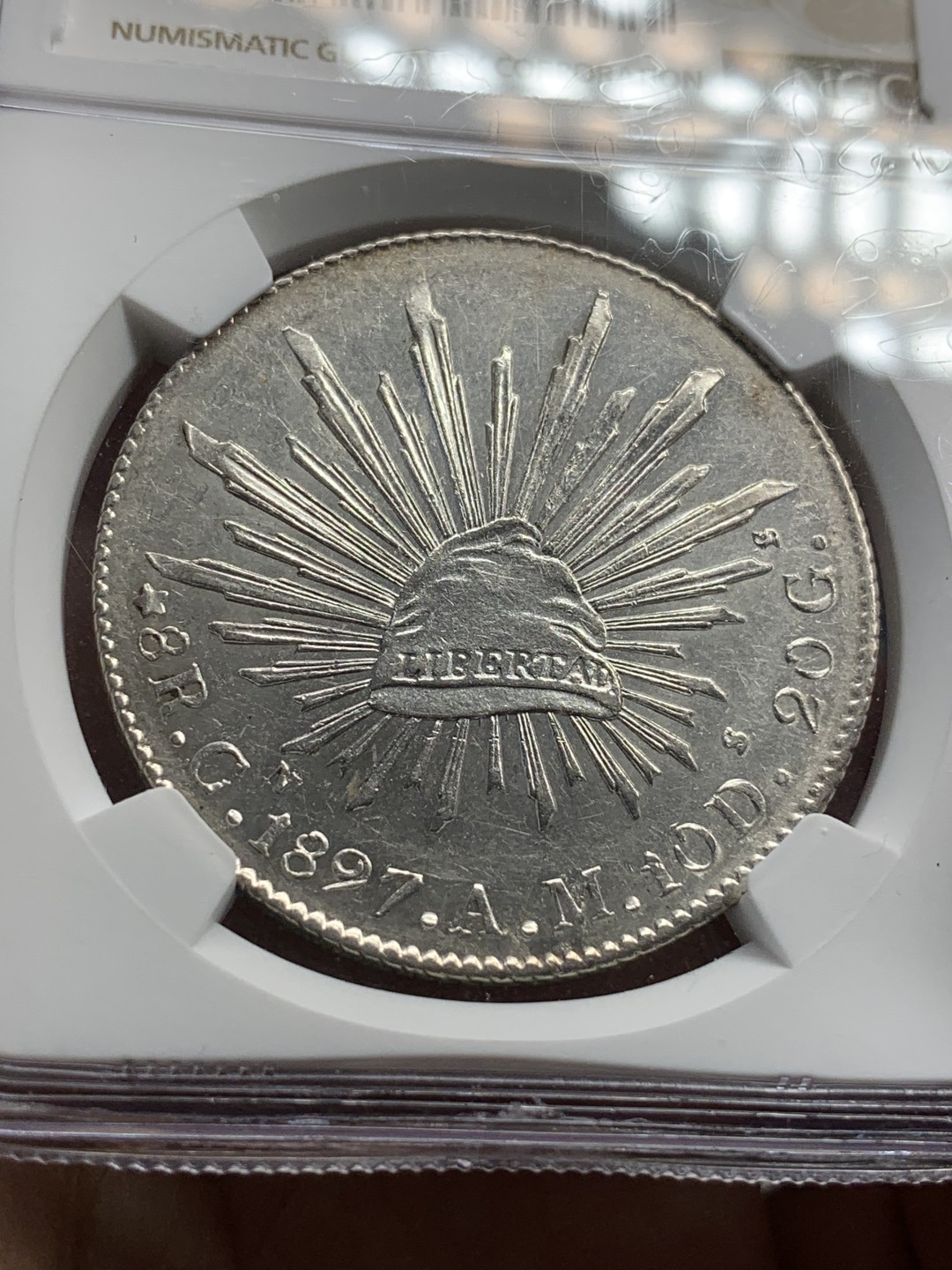 《竞宝斋》第67场-本周日，周一，周四.3场连拍（全场不限金额包邮） NGC MS61 墨西哥 1897年 8R 花边鹰洋 底板深打 状态好，羽毛光亮 一根不少