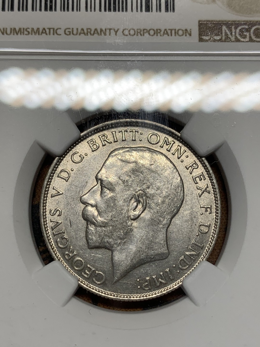 《竞宝斋》第67场-本周日，周一，周四.3场连拍（全场不限金额包邮） NGC-AU58 英国1924年 乔五 2先令 银币 好品像， 买的时候看62的状态买的