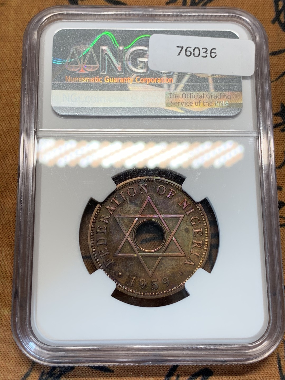 《竞宝斋》第67场-本周日，周一，周四.3场连拍（全场不限金额包邮） 唯一冠军 NGC-PF66RB cameo，1959年尼日利亚精制镜面1便士 铜币 发行量6031枚 紫罗兰包浆 感官极好 难得的藏品