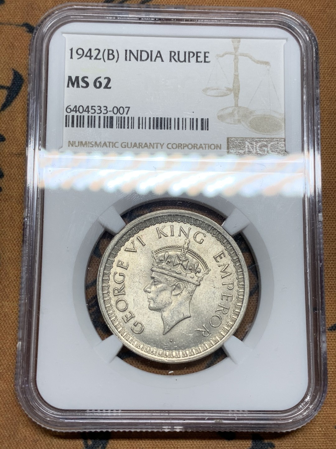 《竞宝斋》第67场-本周日，周一，周四.3场连拍（全场不限金额包邮） NGC-MS62 印度1942年 乔六 1卢比银币 原光好品