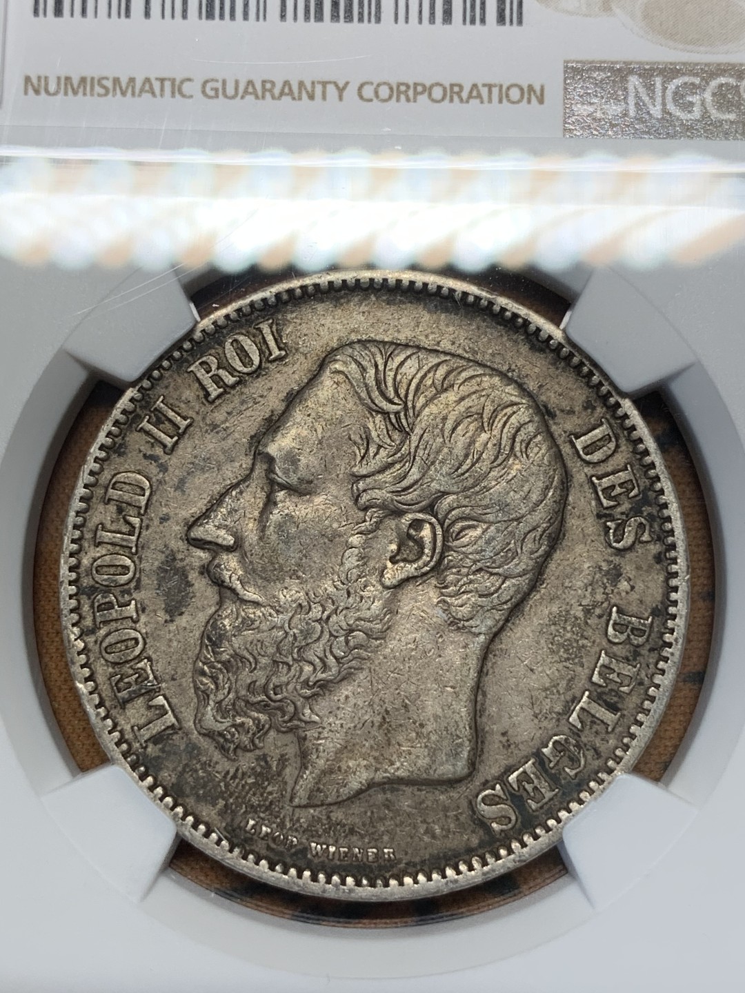 《竞宝斋》第67场-本周日，周一，周四.3场连拍（全场不限金额包邮） NGC AU50 比利时 1868年利奥波德二世五法郎银币 老包浆好品相