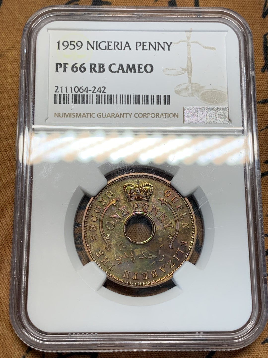 《竞宝斋》第67场-本周日，周一，周四.3场连拍（全场不限金额包邮） 唯一冠军 NGC-PF66RB cameo，1959年尼日利亚精制镜面1便士 铜币 发行量6031枚 紫罗兰包浆 感官极好 难得的藏品
