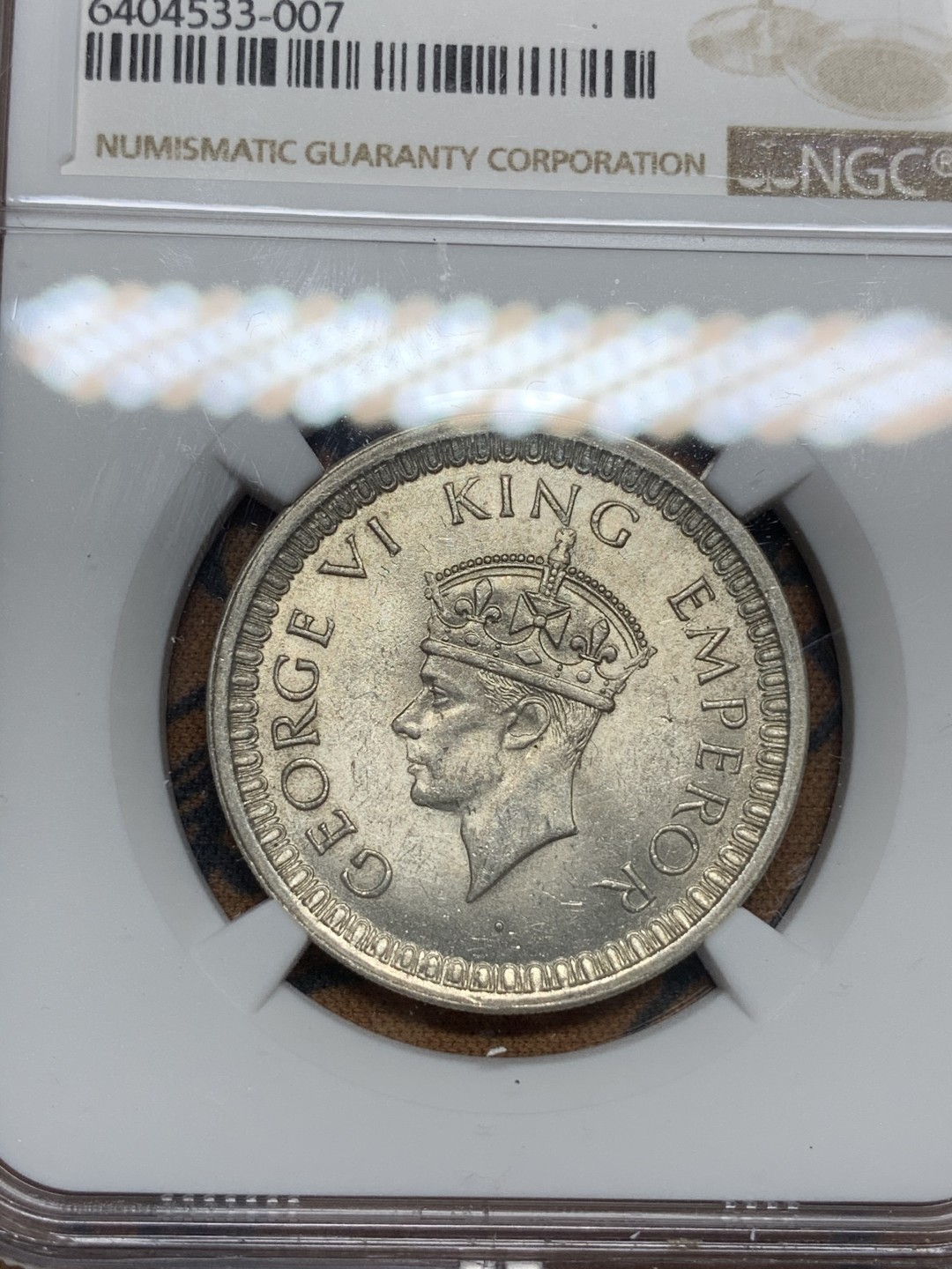 《竞宝斋》第67场-本周日，周一，周四.3场连拍（全场不限金额包邮） NGC-MS62 印度1942年 乔六 1卢比银币 原光好品